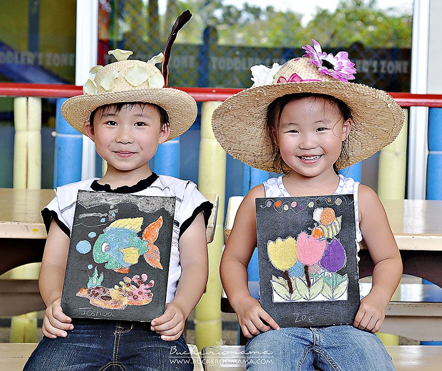 2.20, Proudly displaying their projects:  Hat decoration and sand art.