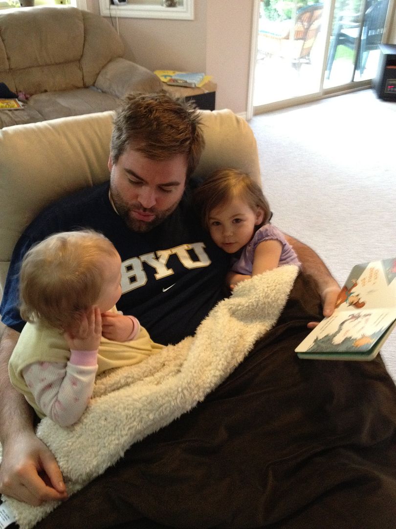 2012.06.08, Loving life while Daddy is home for a visit. The girls wake up and snuggle up on his lap for a story. :)