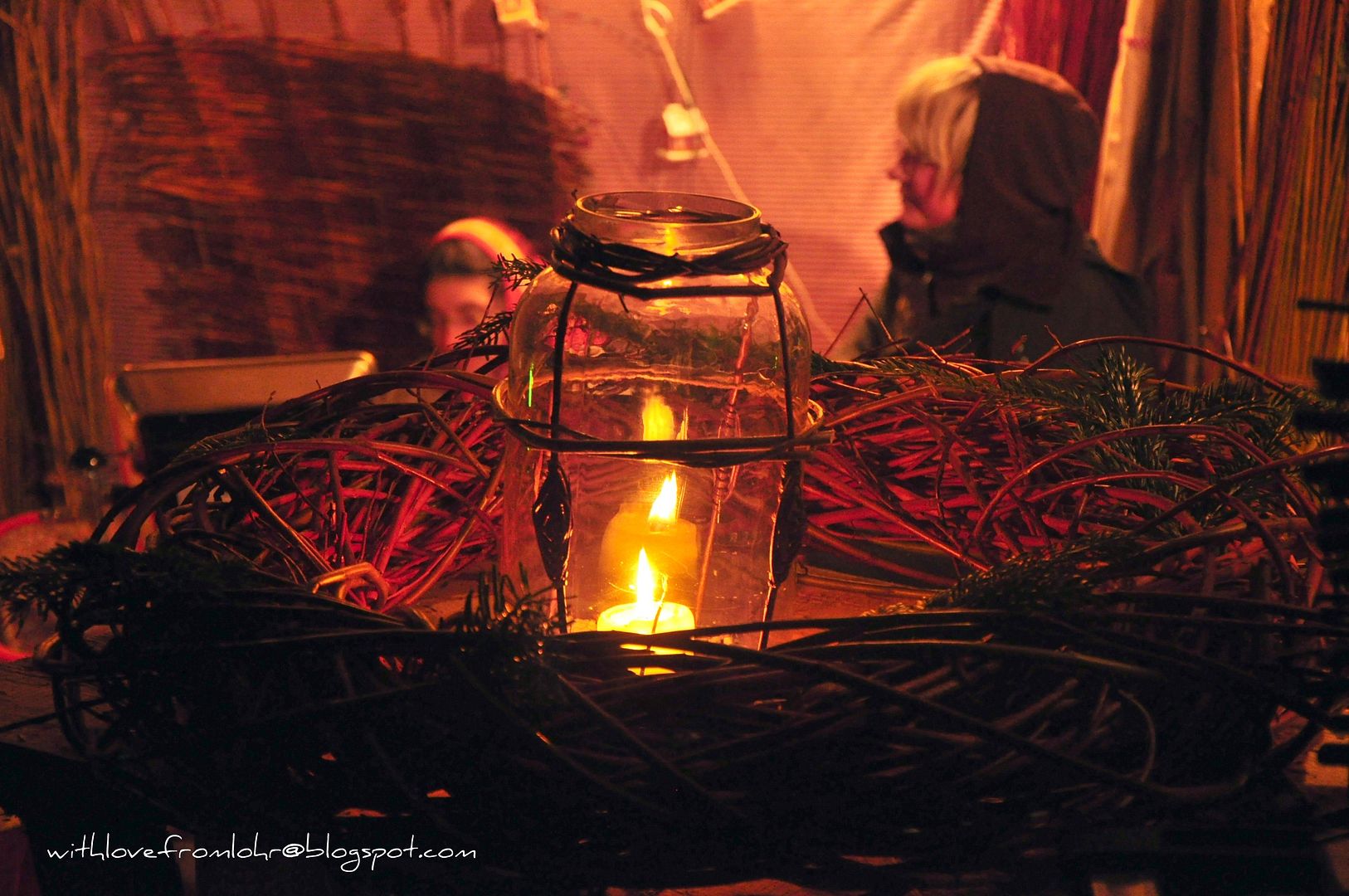 01.12.11, A family preparing Rattan wreaths at the Christmas market.