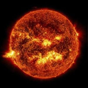 The bright light of a solar flare on the left side of the sun and an eruption of solar material shooting through the sun’s atmosphere, called a prominence eruption, are seen in this NASA handout image taken June 20, 2013, at 11:15 p.m. EDT (03:15 GMT).