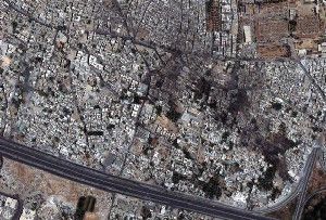 DigitalGlobe Satellite image shows a tank on 6th Rishreen road in the lower left portion of the image in Qabun neighborhood in Damascus, Syria, July 18, 2012.