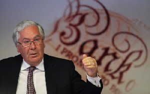 Mervyn King, governor of the Bank of England, seemed to defend Standard Chartered against the allegation that it had schemed with the Iranian government to launder billions of dollars.
