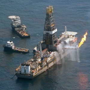 The Transocean Discoverer Enterprise drill ship collects oil from the site of the Deepwater Horizon oil well as workers try to stem the flow of the spill in the Gulf of Mexico, June 12, 2010.