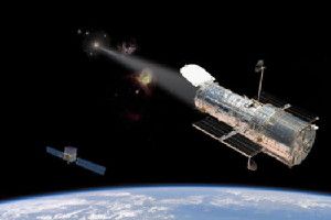 Artist's concept of the Hubble Space Telescope viewing ultraviolet light from the jet of the active galactic nucleus of PKS 1424+240. Clouds of hydrogen gas along the line of sight absorb the light at known frequencies, allowing the redshift and distance of each cloud to be determined. The most distant gas cloud determines the minimum distance to PKS 1424+240. Data from the Fermi Gamma-ray Space Telescope, shown on the horizon at the left, were also used for this study. ( (Credit: Image composition by Nina McCurdy, component images courtesy of NASA)