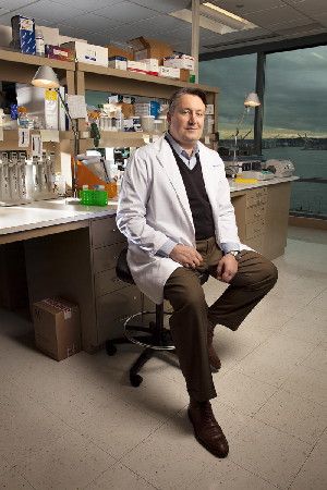 Genome scientist Dr. John Stamatoyannopoulos is part of the international ENCODE effort to discover regulatory elements of DNA. (Credit: Rick Dahms)
