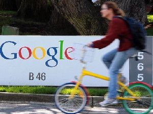 A Google employee rides to work at Google in Mountain View, Calif.