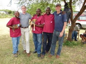 This image shows members of the Allen School and the Serengeti Health Initiative, who have vaccinate as many as 1,000 dogs a day in Tanzania. From left: Machunde Bigambo, asst. project manager; Guy Palmer, Allen School director, Imam Mzimbiri, project manager and veterinarian, Paulo Tembo, field Assistant and mechanic; Felix Lankester, East-Africa based researcher, Allen School