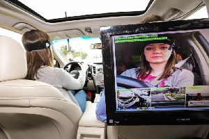 A study participant drives while research equipment monitors reaction times and gathers other data. A set of new University of Utah studies for the AAA Foundation for Traffic Safety found that hands-free, voice-controlled infotainment systems in vehicles can distract drivers more than was previously believed.