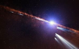 This artist's impression shows exocomets orbiting the star Beta Pictoris. Astronomers analysing observations of nearly 500 individual comets ...