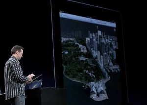 Apple's senior vice president of iPhone software, Scott Forstall, demonstrates Fly Over, part of the new map application featured on iOS 6, during the 2012 Apple Worldwide Developers Conference in San Francisco. (Justin Sullivan / Getty Images / June 11, 2012)