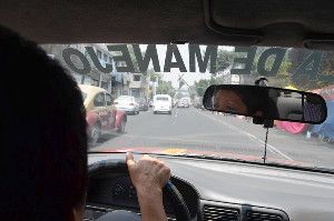 Patricia Sanchez pulls out into Mexico City's notoriously dangerous traffic during a lesson.