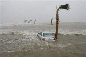 A car sits partially submerged in the storm surge generated by Hurricane Gustav.