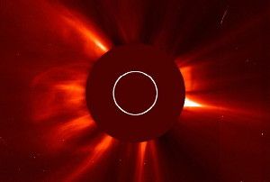 Image Caption: ESA and NASA’s Solar Heliospheric Observatory (SOHO) captured this image of a coronal mass ejection bursting off the leftside of the image at 9:25 p.m. EDT on March 12, 2013. This sun itself is obscured in this image, called a coronagraph, in order to better see the dimmer structures around it. Credit: ESA&NASA/SOHO