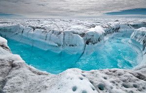 Greenland and Antarctica lost 4,260 billion metric tons of ice through melting (meltwater in Greenland shown) and calving icebergs, a new study finds.