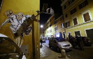 A graffiti depicting Pope Francis as Superman and holding a bag with a writing which reads: 'Values' is seen on a wall of the Borgo Pio district near St. Peter's Square in Rome, Tuesday, Jan. 28, 2014. It wasn't enough that Pope Francis was named Time magazine's 'Person of the Year' or that he fronted this week's Rolling Stone magazine. Now there's SuperPope graffiti sprouting up around the Vatican. The white caped crusader appeared Tuesday on a wall just off Borgo Pio, a tiny cobble-stoned street near St. Peter's Square. In typical superhero fashion, Francis' right fist is thrust in the air, leading him in flight, while his left clutches his black satchel. 'Valores,' or values in Spanish, is written across it. The artist is identified only as Maupal. Francis has charmed the masses with his simplicity and message of helping the poor, even as he has cracked down on Vatican waste and corruption. The Vatican communications office approved of the image, tweeting a photo Tuesday. (AP Photo/Gregorio Borgia)