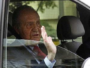 Spanish King Juan Carlos leaves a hospital on April 18, 2012 in Madrid where he was admitted after breaking his hip during an African elephant hunt. The trip provoked a scandal in Spain. Photographer: Pierre-Philippe Marcou/AFP/Getty Images
