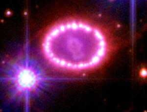 Supernova 1987A popped off in the centre of the 'pearl necklace' (Image: NASA/ESA/P. Challis/R. Kirshner/CfA)