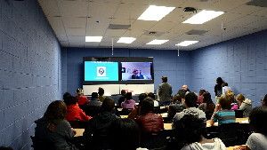 Students at Westlake High School in Waldorf, Md., participate in an interactive digital conversation with historian Kenneth C. Davis about late 19th and early 20th century American history on Thursday. The school uses a state of the art 'telepresence center' for students to connect with experts all over the world.