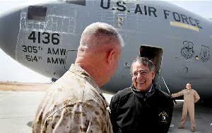 Leon Panetta, right, arrives at Camp Bastion Photo: GETTY