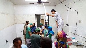 Doctors Without Borders (MSF) staff are seen during a surgery after a US airstrike on MSF hospital in Kunduz, Afghanistan on October 03, 2015.