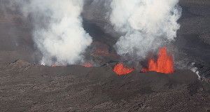 WATERY WORLD  Water molecules embedded inside lava spewed by volcanoes in Iceland (like the one shown) and Canada suggest that Earth’s H2O originated from water-laden dust.