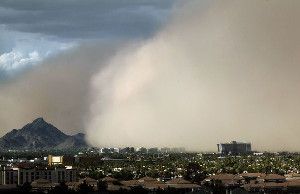 A massive cloud of dust looms over Phoenix, Arizona during a dust strom in July 2012.