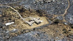 This aerial photo from July 3 shows Yarnell, Ariz., after the Yarnell Hill Fire burned through and claimed the lives of 19 members of an elite firefighting crew.